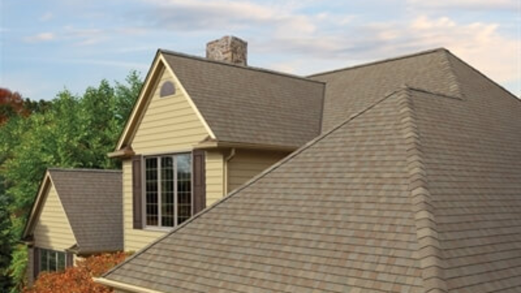Photo of a home using GAF's Timberline American Harvest Amber Wheat shingles